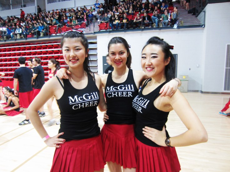 Amy (right) in a cheerleading competition at MedGames in Quebec City in January 2013